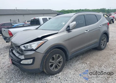 2014 Hyundai Santa Fe Sport 2.4L z USA, uszkodzony, nr VIN 5XYZU3LB4EG143870